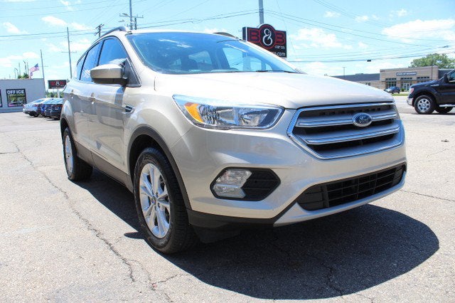 2018 Ford Escape SE in Gold — front three-quarter view