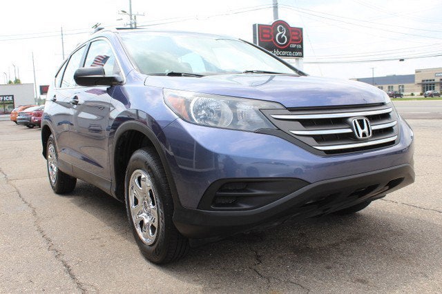 2013 Honda CR-V LX in Blue — front three-quarter view