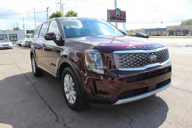 2021 Kia Telluride LX in Sangria — front three-quarter view
